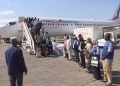 وصول الفوج الثاني للاجئين السودانيين في أوغندا إلى مطار بورتسودان